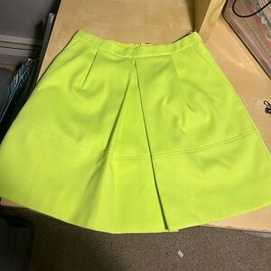 J crew neon green/ yellow color skirt with pockets. Never worn. No tags